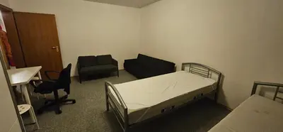 Ein Bett oder Betten in einem Zimmer der Unterkunft Zentralgelegene Wohnung im EG