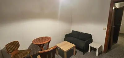 Ein Sitzbereich in der Unterkunft Zentralgelegene Wohnung im EG