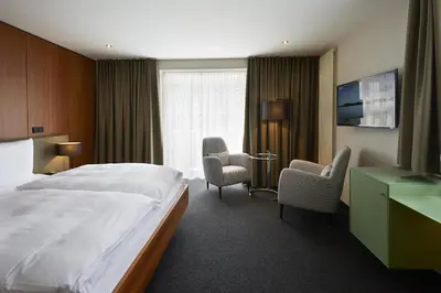 Ein Bett oder Betten in einem Zimmer der Unterkunft Consulat des Weins