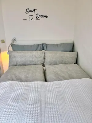 Ein Bett oder Betten in einem Zimmer der Unterkunft Ferienwohnung Spessartzeit - ruhig & naturnah im Spessart