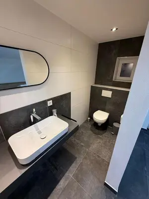 Ein Badezimmer in der Unterkunft Ferienwohnung Tee - Time - Lodge und Kirsch - Kiste