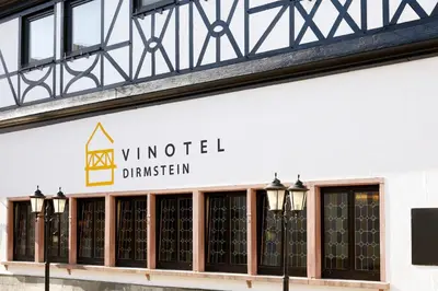 Ein Zertifikat, Auszeichnung, Logo oder anderes Dokument, das in der Unterkunft Vinotel Dirmstein ausgestellt ist