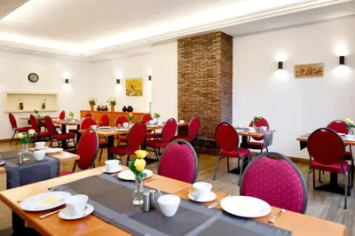 Ein Restaurant oder anderes Speiselokal in der Unterkunft Vinotel Dirmstein