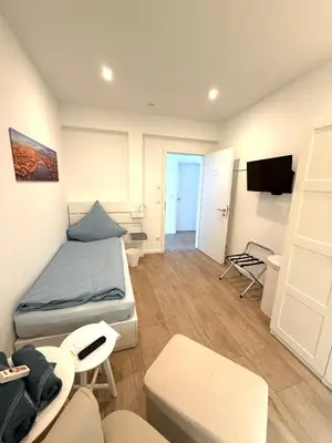 TV/Unterhaltungsangebot in der Unterkunft B3 Boardinghouse bei Becker