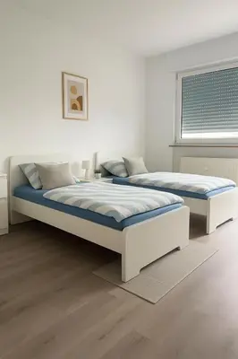 Ein Bett oder Betten in einem Zimmer der Unterkunft Monteur- und Ferienwohnung Viernheim
