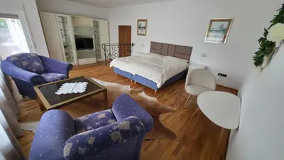 Ein Bett oder Betten in einem Zimmer der Unterkunft ALESIA Ferienwohnung Südpfalz