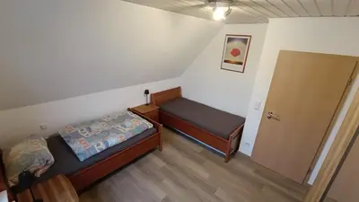 Ein Bett oder Betten in einem Zimmer der Unterkunft Ferienwohnung am Lachendeich