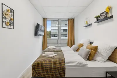 Ein Bett oder Betten in einem Zimmer der Unterkunft Urban Havn - 6 Apartments mit top Anbindung für bis zu 34 Personen