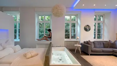 Ein Sitzbereich in der Unterkunft Boutique Suites and Residences Heidelberg- Alte Zigarrenmanufaktur