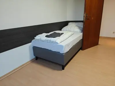 Ein Bett oder Betten in einem Zimmer der Unterkunft Karlsbader35