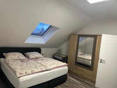 Ein Bett oder Betten in einem Zimmer der Unterkunft Ferienwohnung Steinberg