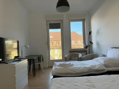 Ein Bett oder Betten in einem Zimmer der Unterkunft 6 Einzelbetten - 4 Zimmer - eigener PARKPLATZ - Balkon