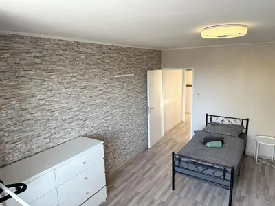 Ein Bett oder Betten in einem Zimmer der Unterkunft Work and Stay near Frankfurt Airport 2BR and Balcony