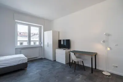 Ein Bett oder Betten in einem Zimmer der Unterkunft 7-Einzelbetten-3-Zimmer-NEUES-BAD-Wama
