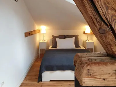 Ein Bett oder Betten in einem Zimmer der Unterkunft Bahnhof Grombach