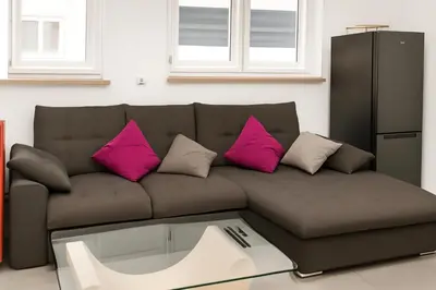 Ein Sitzbereich in der Unterkunft City Apartment Bequem