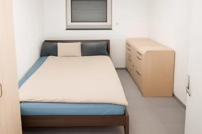 Ein Bett oder Betten in einem Zimmer der Unterkunft City Apartment Bequem