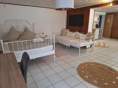 Ein Bett oder Betten in einem Zimmer der Unterkunft Rheinperle - Feel at home Entire apartment