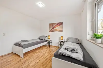 Ein Bett oder Betten in einem Zimmer der Unterkunft GU03 Monteursunterkunft in Griesheim!