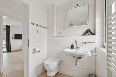 Ein Badezimmer in der Unterkunft GU02 Wohnung mit Terrasse in Griesheim!