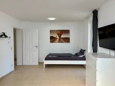 TV/Unterhaltungsangebot in der Unterkunft GU02 Wohnung mit Terrasse in Griesheim!