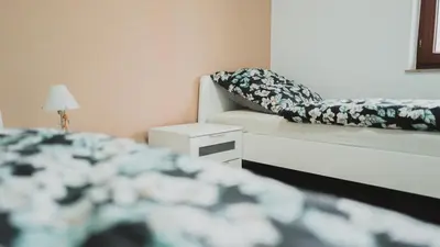Ein Bett oder Betten in einem Zimmer der Unterkunft Ferienwohnungen Bullau