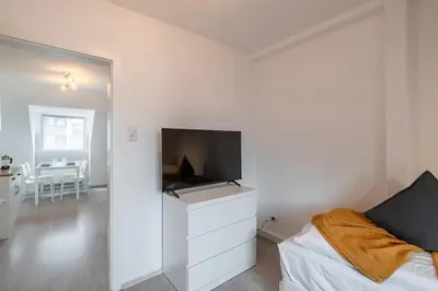 TV/Unterhaltungsangebot in der Unterkunft 2 Zimmer Dachstudio Apartment mit 4 Einzelbetten