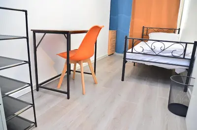 Ein Bett oder Betten in einem Zimmer der Unterkunft Xenon hostels