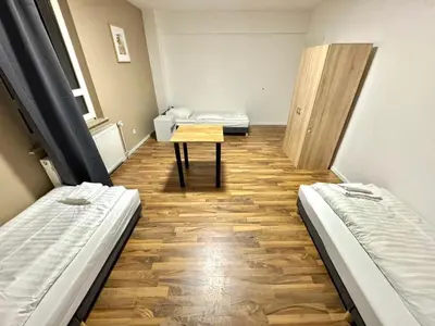 Ein Bett oder Betten in einem Zimmer der Unterkunft Casa Heusenstamm