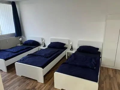 Ein Bett oder Betten in einem Zimmer der Unterkunft Nähe BASF-BG Klinik - MonteurzimmerFirstChoice