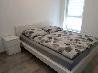 Ein Bett oder Betten in einem Zimmer der Unterkunft Exclusive new apartment
