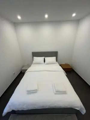 Ein Bett oder Betten in einem Zimmer der Unterkunft Modern new-build apartment