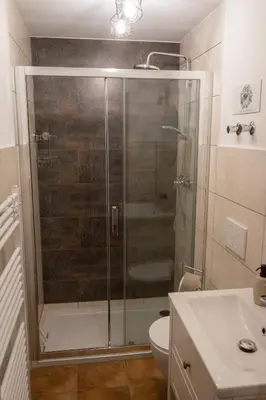 Ein Badezimmer in der Unterkunft Ferienwohnung Feuer im Ferienhaus am Waldbach