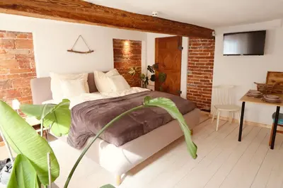 Ein Bett oder Betten in einem Zimmer der Unterkunft Klinkerstube