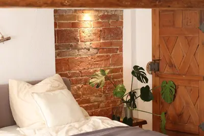 Ein Bett oder Betten in einem Zimmer der Unterkunft Klinkerstube