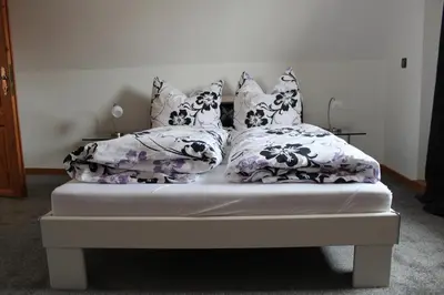 Ein Bett oder Betten in einem Zimmer der Unterkunft Ferienhaus Wingarda