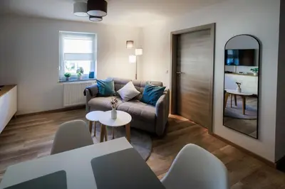 Ein Sitzbereich in der Unterkunft Stylishes Premium Apartment