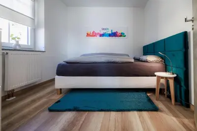Ein Bett oder Betten in einem Zimmer der Unterkunft Stylishes Premium Apartment
