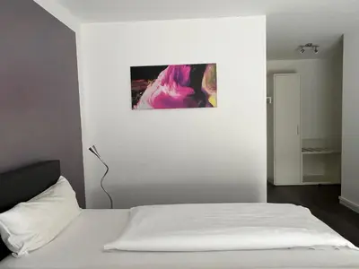 Ein Bett oder Betten in einem Zimmer der Unterkunft Victoria Living