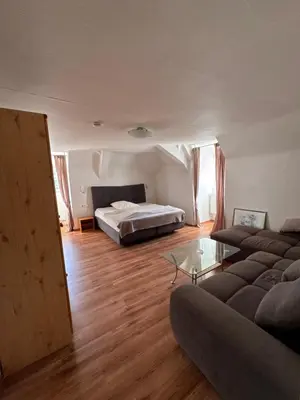 Ein Bett oder Betten in einem Zimmer der Unterkunft Gasthaus & Pension Grüner Baum Eberbach