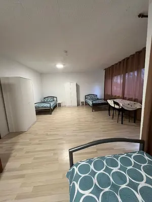 Ein Bett oder Betten in einem Zimmer der Unterkunft Rodgau Work & Sleep