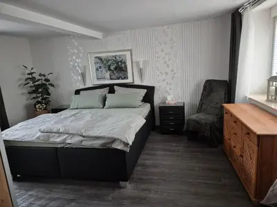 Ein Bett oder Betten in einem Zimmer der Unterkunft Rebenhaus St Martin
