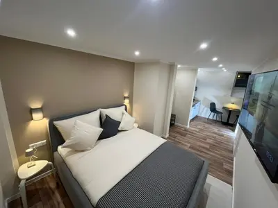 Ein Bett oder Betten in einem Zimmer der Unterkunft Lumio Apartment 1