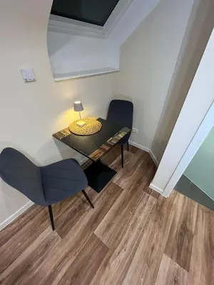 Ein Sitzbereich in der Unterkunft Lumio Apartment 1
