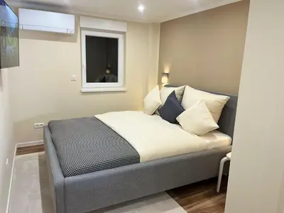 Ein Bett oder Betten in einem Zimmer der Unterkunft Lumio Apartment 1