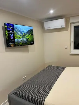 Ein Bett oder Betten in einem Zimmer der Unterkunft Lumio Apartment 1