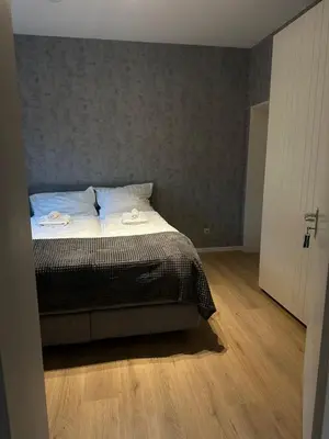 Ein Bett oder Betten in einem Zimmer der Unterkunft Modern 2-room apartment with large kitchen