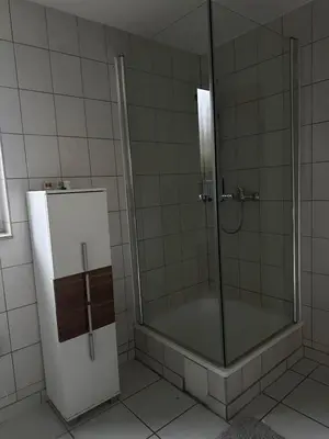 Ein Badezimmer in der Unterkunft Modern 2-room apartment with large kitchen