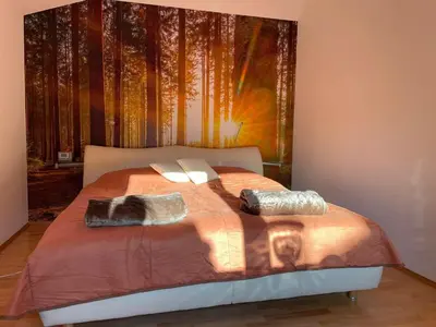 Ein Bett oder Betten in einem Zimmer der Unterkunft Kleine Pfalz im Casa del Cornelia