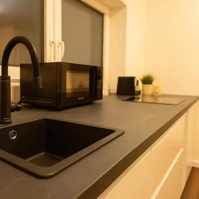 Küche/Küchenzeile in der Unterkunft Loft Wohnung in St Leon Rot
